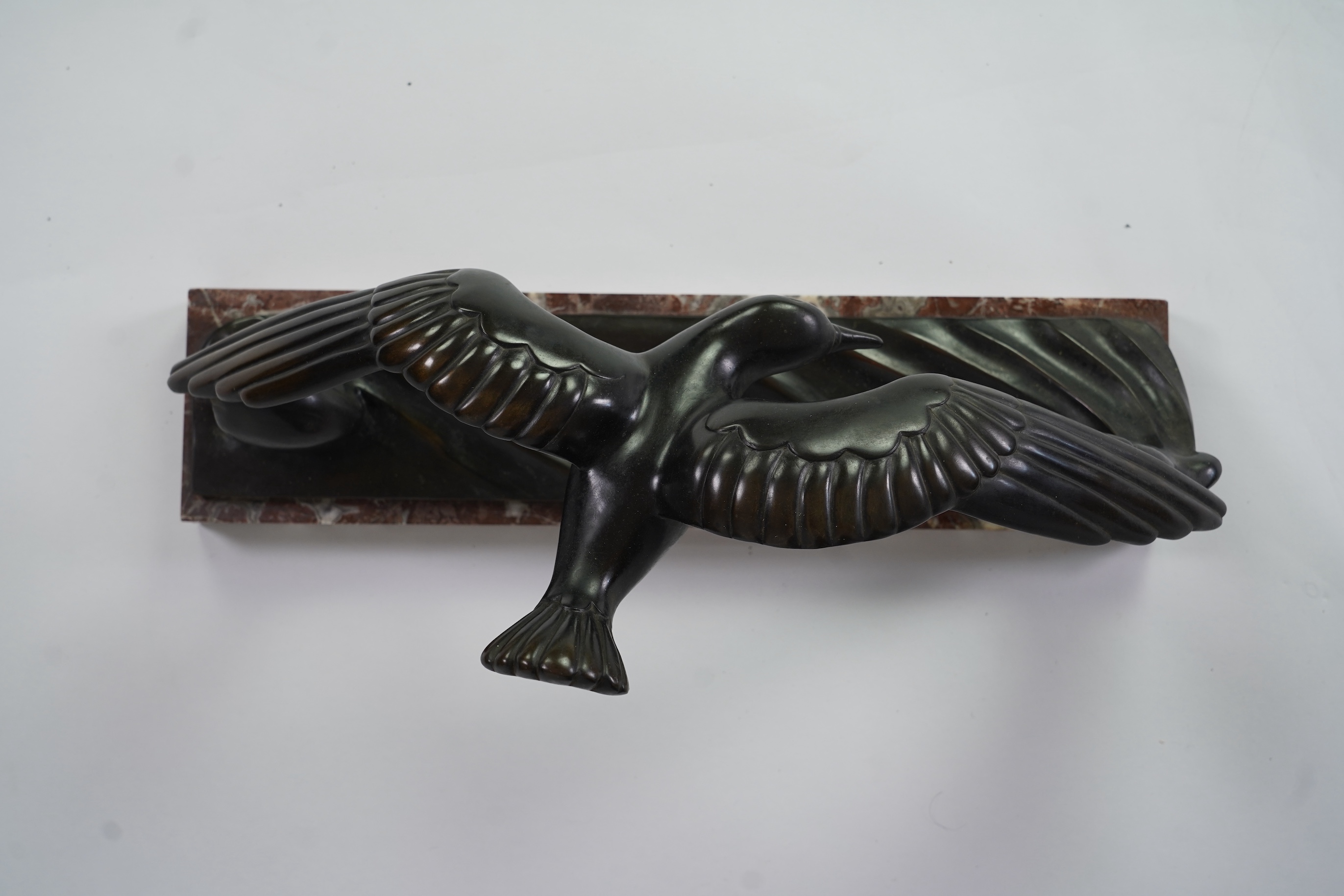 An Art Deco bronze figure of a tern, signed Andre